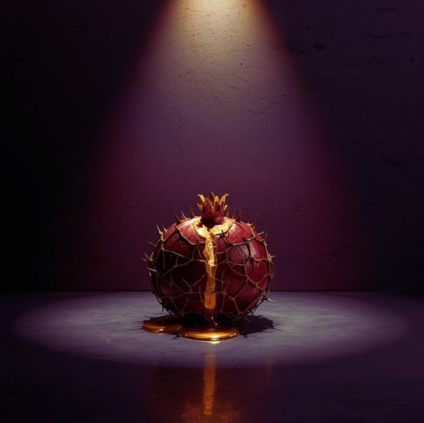 Goldener Granatapfel mit Dornen. Info: Schatten der emotionalen Vereinnahmung.